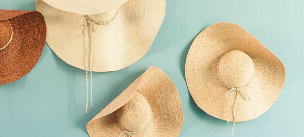 an assortment of summer hats you can find at local madison boutique shops