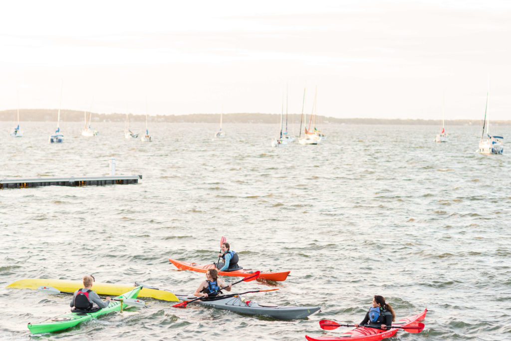 Kayakers paddle on Lake Mendota in the summer in Madison, WI